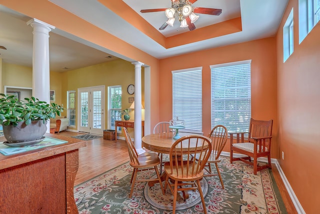 405 Decatur Dr, Summerville, SC 29486 - dining area featuring baseboards, a ceiling fan, decorative columns, and wood finished floors