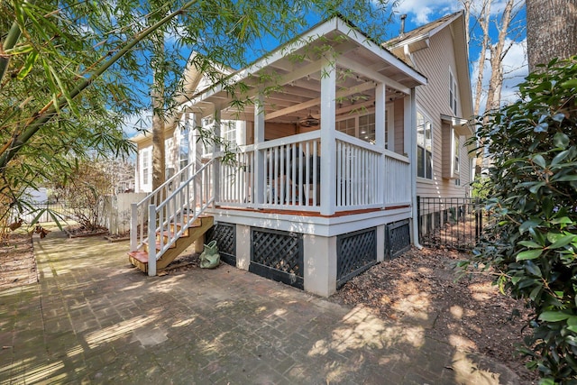 exterior space featuring a patio area and fence