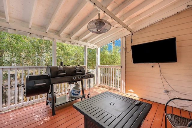 wooden terrace with grilling area