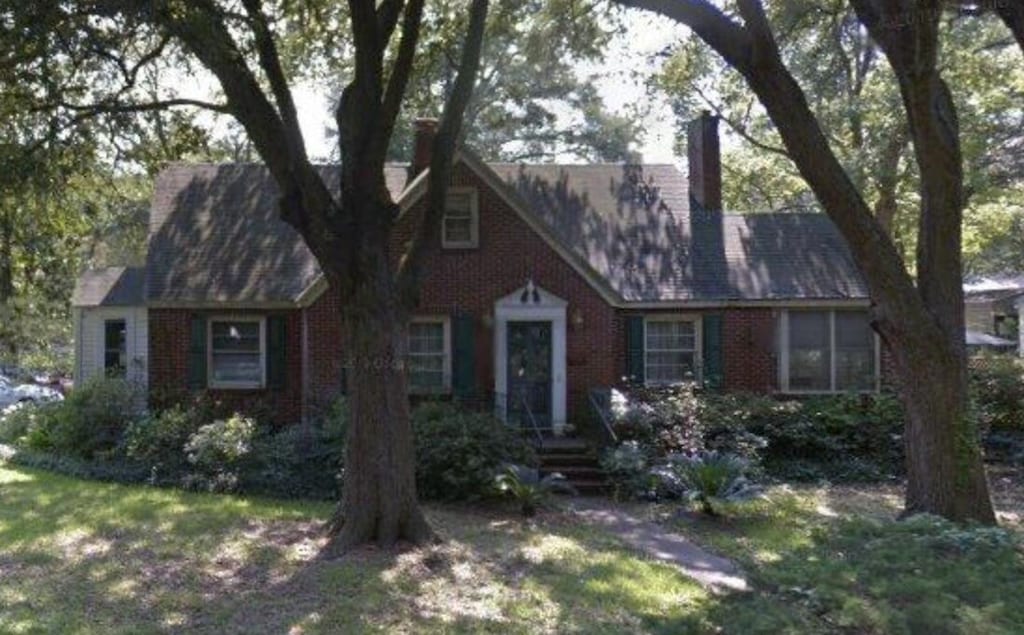 218 Yates Ave, Charleston, SC 29412 - view of front of property featuring a chimney and brick siding