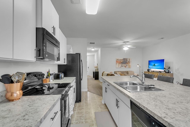 kitchen with ceiling fan, white cabinets, sink, and black appliances