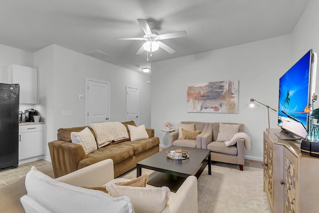 living room featuring ceiling fan