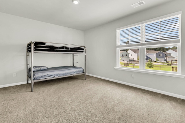 unfurnished bedroom featuring carpet