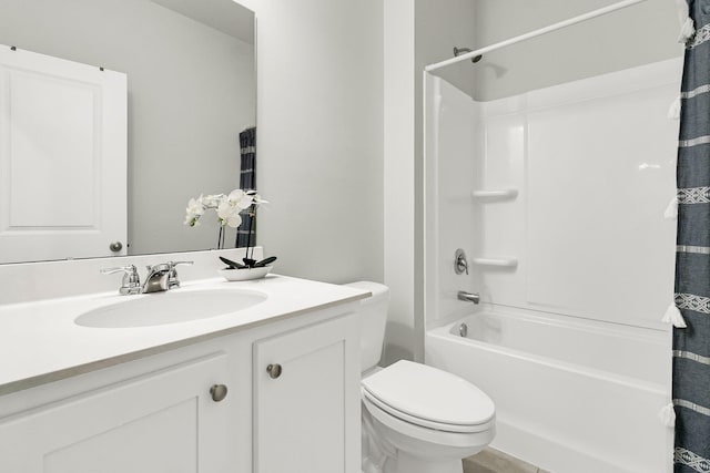 full bathroom with toilet, vanity, and shower / bath combo with shower curtain