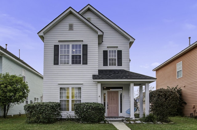 front of property featuring a front lawn