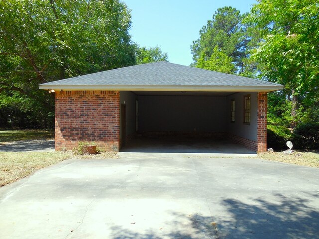 garage with a carport