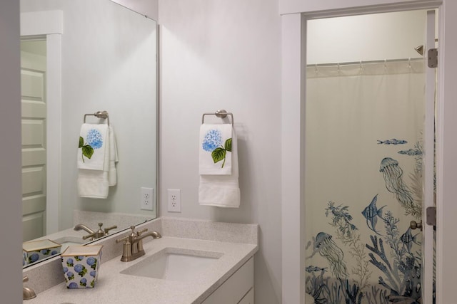 bathroom featuring vanity and walk in shower