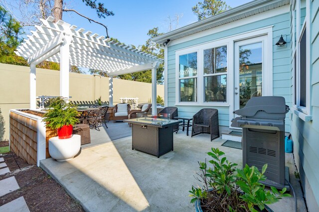 view of patio / terrace with a grill, an outdoor living space with a fire pit, and a pergola