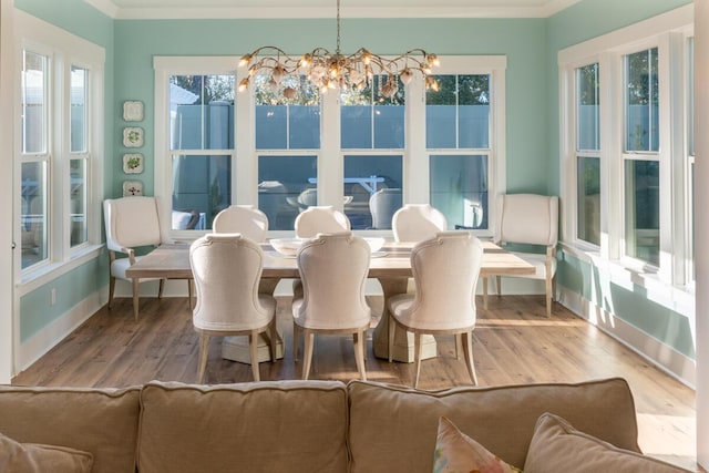 sunroom with an inviting chandelier