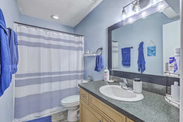bathroom with toilet, a shower with shower curtain, vanity, and a textured ceiling