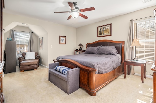 bedroom with light colored carpet and ceiling fan