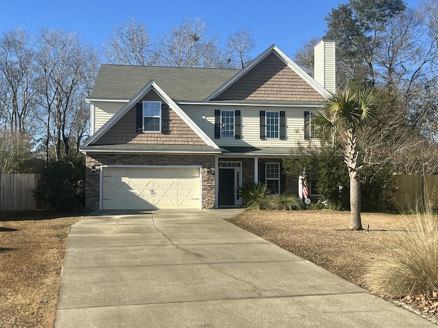 view of front of property with a garage