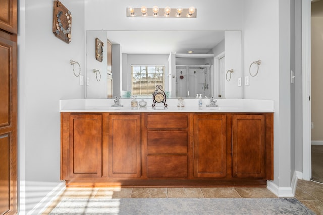 bathroom featuring vanity and a shower with door