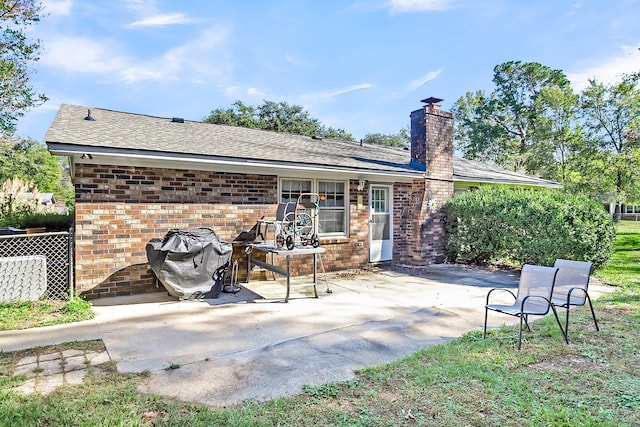 rear view of house with a patio area