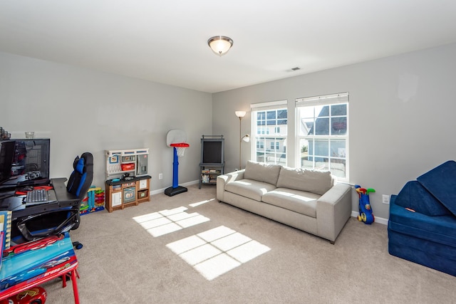 living room featuring light carpet