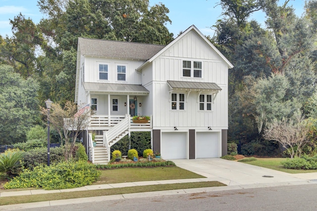 view of front of property featuring a porch and a garage