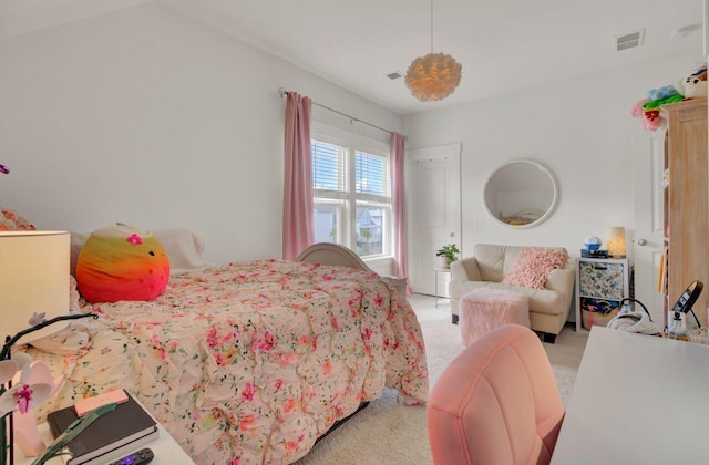 bedroom featuring light carpet and vaulted ceiling