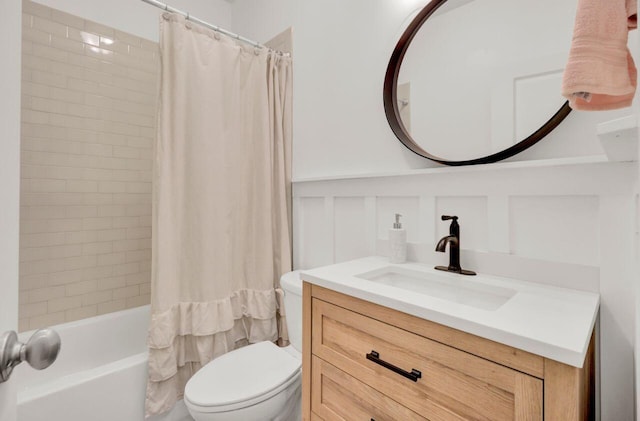 full bathroom featuring vanity, shower / bath combination with curtain, and toilet