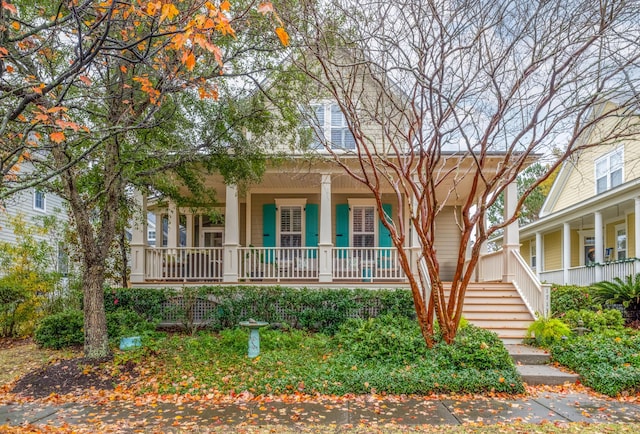 farmhouse inspired home with covered porch