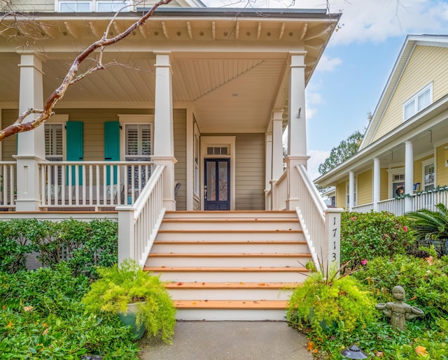 doorway to property with a porch