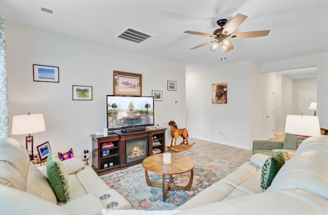 135 Cypress Preserve Blvd, Moncks Corner, SC 29461 - living room with wood finished floors, ceiling fan, and baseboards