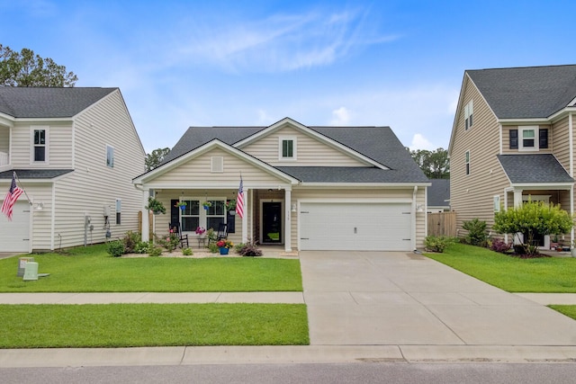 135 Cypress Preserve Blvd, Moncks Corner, SC 29461 - view of front of property featuring a front yard, covered porch, driveway, and a garage