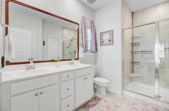 135 Cypress Preserve Blvd, Moncks Corner, SC 29461 - full bathroom featuring a shower stall, toilet, double vanity, tile patterned flooring, and baseboards