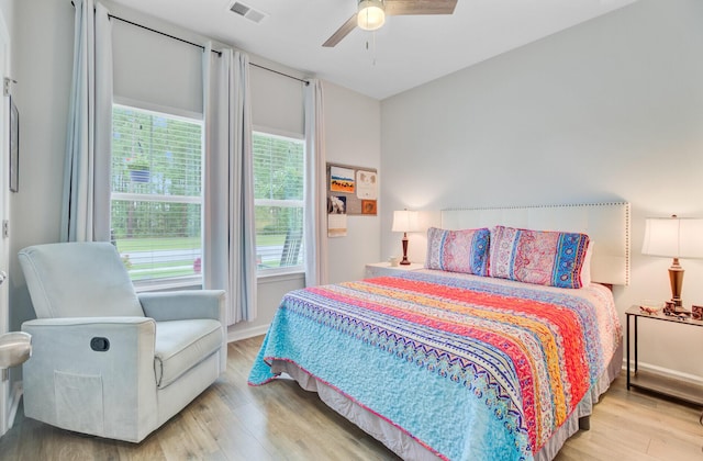 135 Cypress Preserve Blvd, Moncks Corner, SC 29461 - bedroom with wood finished floors, ceiling fan, and baseboards