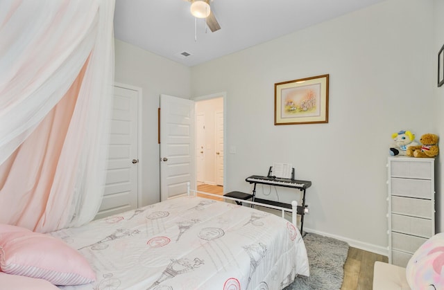 135 Cypress Preserve Blvd, Moncks Corner, SC 29461 - bedroom featuring wood finished floors, baseboards, and ceiling fan