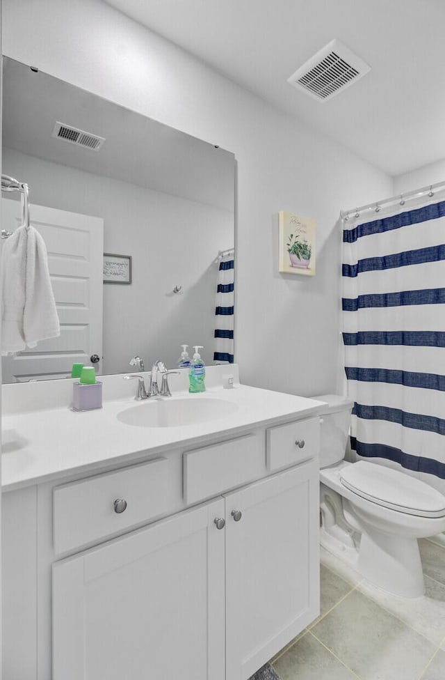 135 Cypress Preserve Blvd, Moncks Corner, SC 29461 - bathroom featuring double vanity, toilet, tile patterned flooring, and a shower with curtain