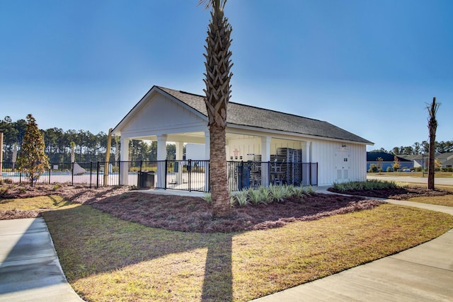 135 Cypress Preserve Blvd, Moncks Corner, SC 29461 - view of side of property featuring board and batten siding, roof with shingles, and a patio area