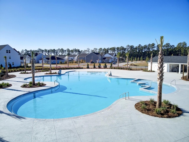 135 Cypress Preserve Blvd, Moncks Corner, SC 29461 - community pool with a residential view and a patio
