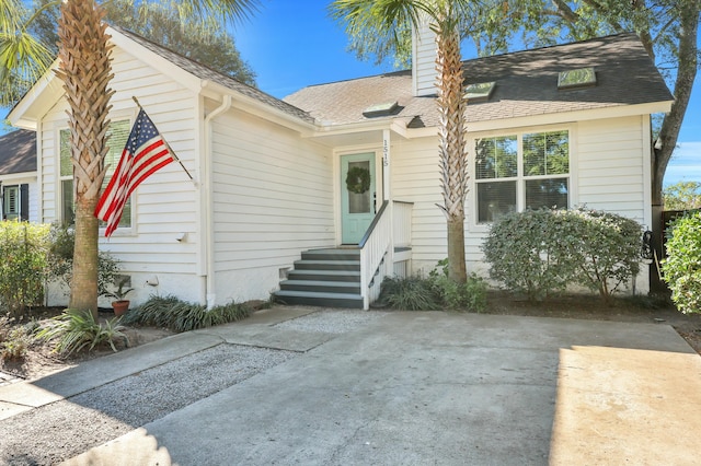 view of new england style home