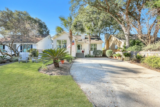 view of front of house with a front lawn