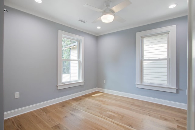 spare room featuring a ceiling fan, recessed lighting, light wood finished floors, and baseboards