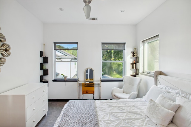 bedroom with dark carpet