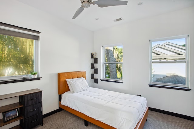 carpeted bedroom with ceiling fan