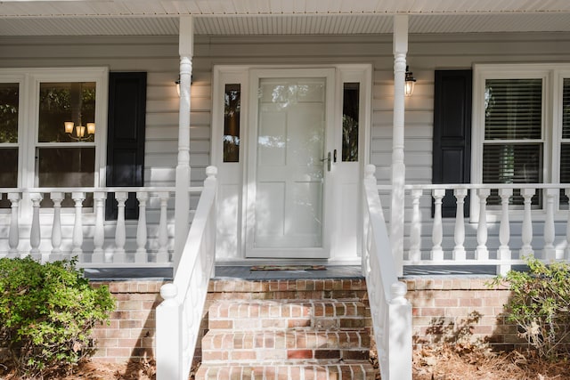 property entrance with a porch