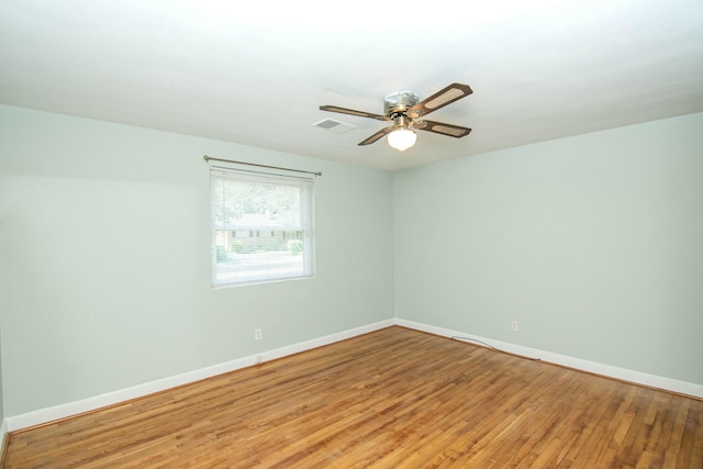 unfurnished room featuring hardwood / wood-style floors