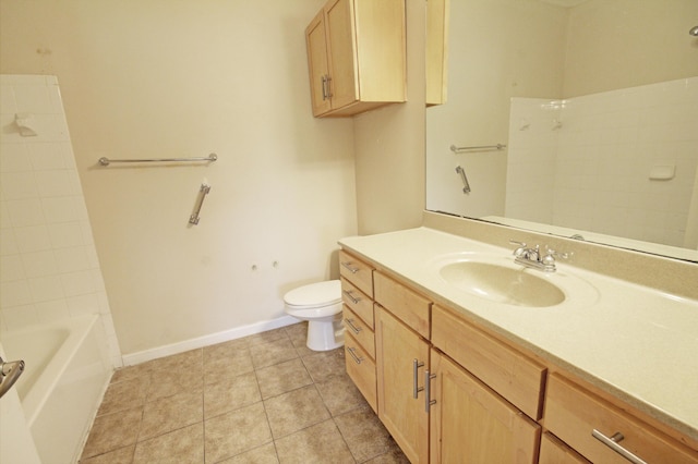 bathroom with tile patterned floors, vanity, and toilet