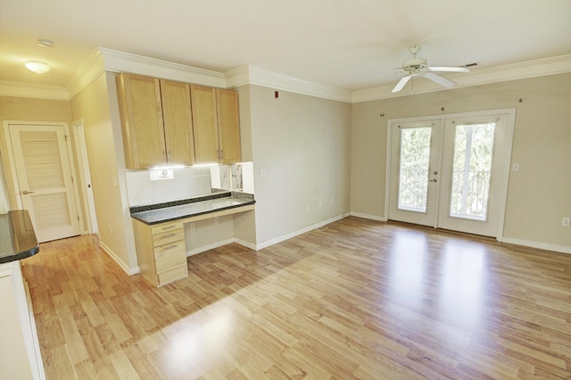 kitchen featuring light brown cabinets, light hardwood / wood-style flooring, and french doors