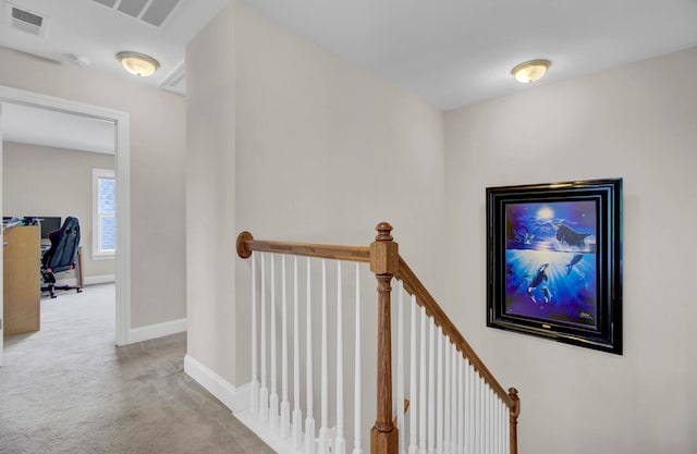 corridor with carpet flooring