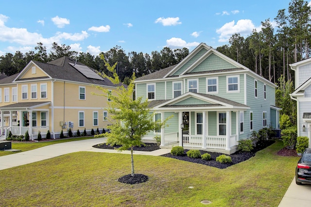 view of front of house featuring a front lawn and a porch