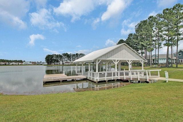 view of dock featuring a water view and a lawn