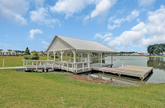 view of dock featuring a water view and a lawn