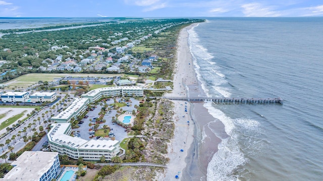 birds eye view of property featuring a view of the beach and a water view