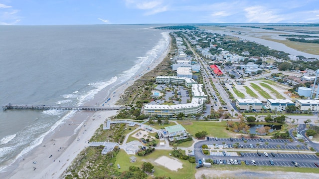 bird's eye view featuring a view of the beach and a water view