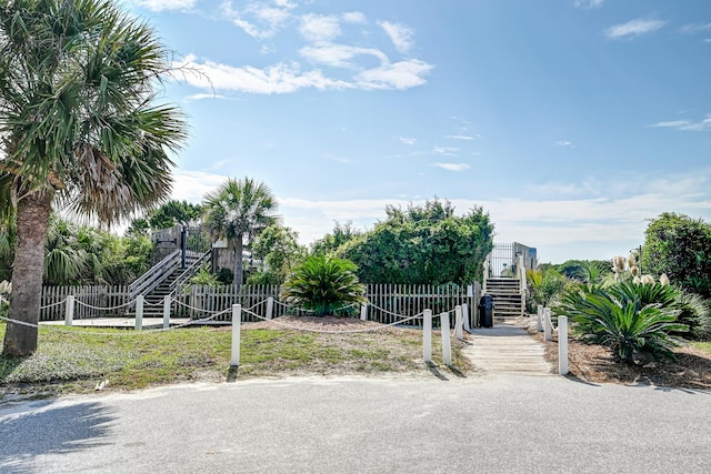 surrounding community with stairs and fence