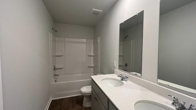 158 Yarrow Way, Moncks Corner, SC 29461 - bathroom with visible vents, a sink, toilet, and wood finished floors
