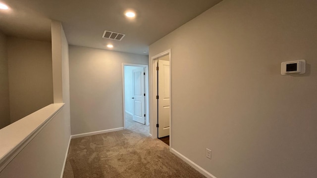 158 Yarrow Way, Moncks Corner, SC 29461 - hall with dark carpet, baseboards, visible vents, and recessed lighting